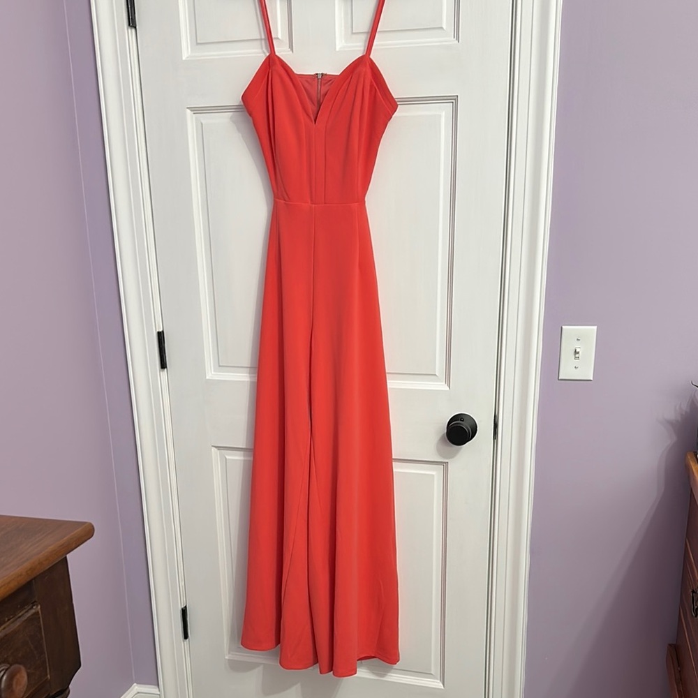 Elegant Peach/Red Jump Suit with cut out back.
